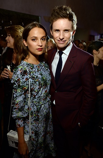 WEST HOLLYWOOD, CA - FEBRUARY 26: Actors Alicia Vikander (L) and Eddie Redmayne attend the Film is GREAT Reception at Fig & Olive on February 26, 2016 in West Hollywood, California. (Photo by Michael Kovac/Getty Images for The GREAT Britain Campaign)