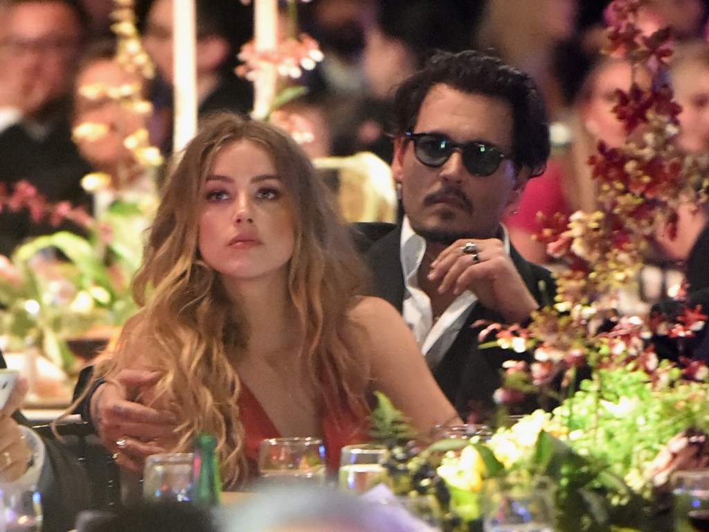 Actors Amber Heard and Johnny Depp attend The Art of Elysium 2016 HEAVEN Gala presented by Vivienne Westwood & Andreas Kronthaler at 3LABS on January 9, 2016 in Culver City, California. (Photo by Jason Merritt/Getty Images for Art of Elysium)