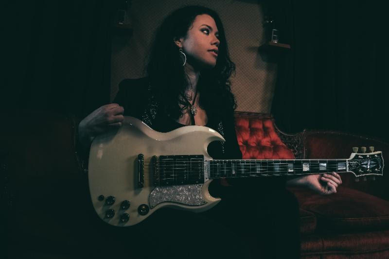 Liz Brasher with Gibson SG Custom at the Gibson Showroom. Credit: Ryan Vestil.