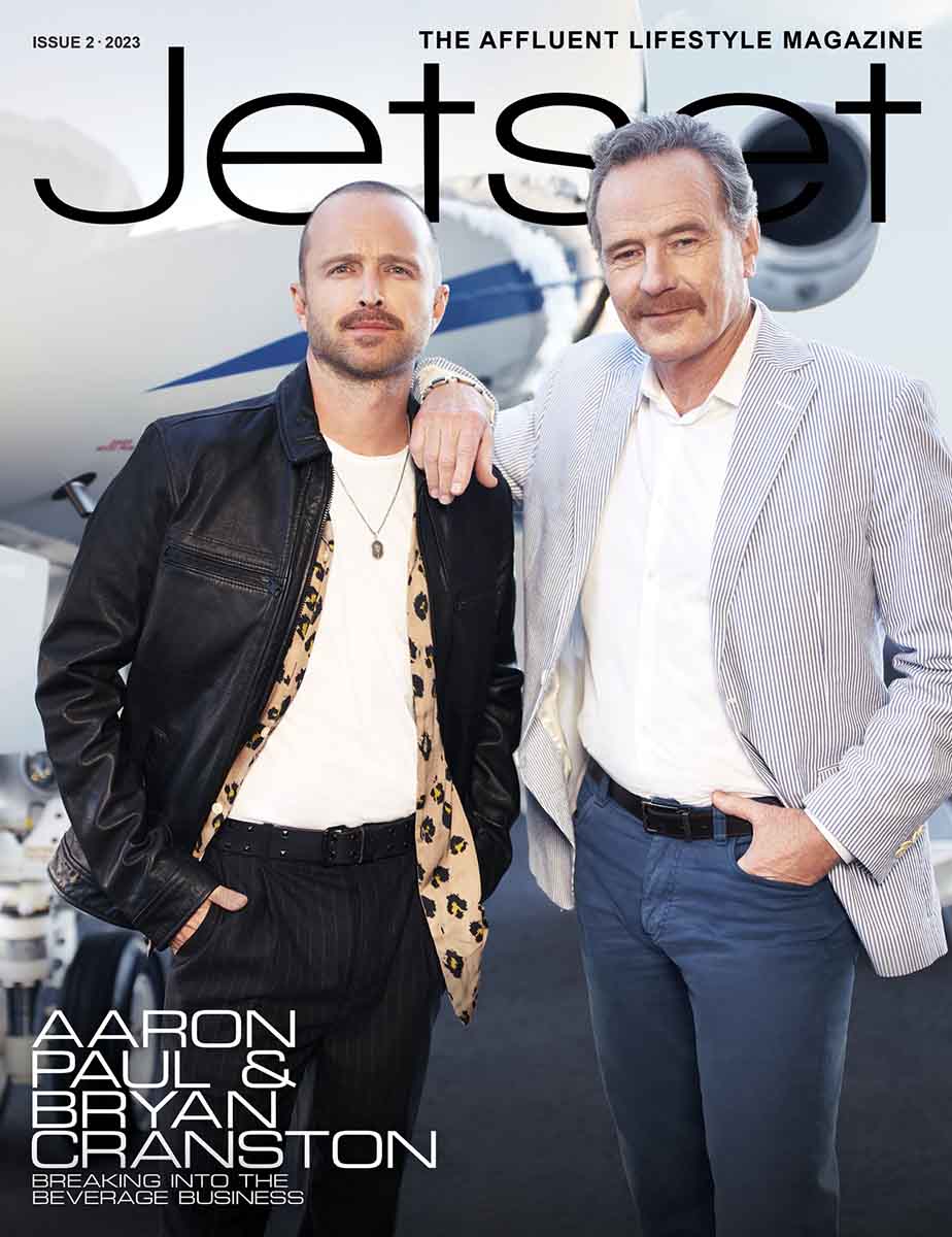 Jetset Magazine Issue 2 2023, featuring Bryan Cranston and Aaron Paul in front of a Boeing Jet. 