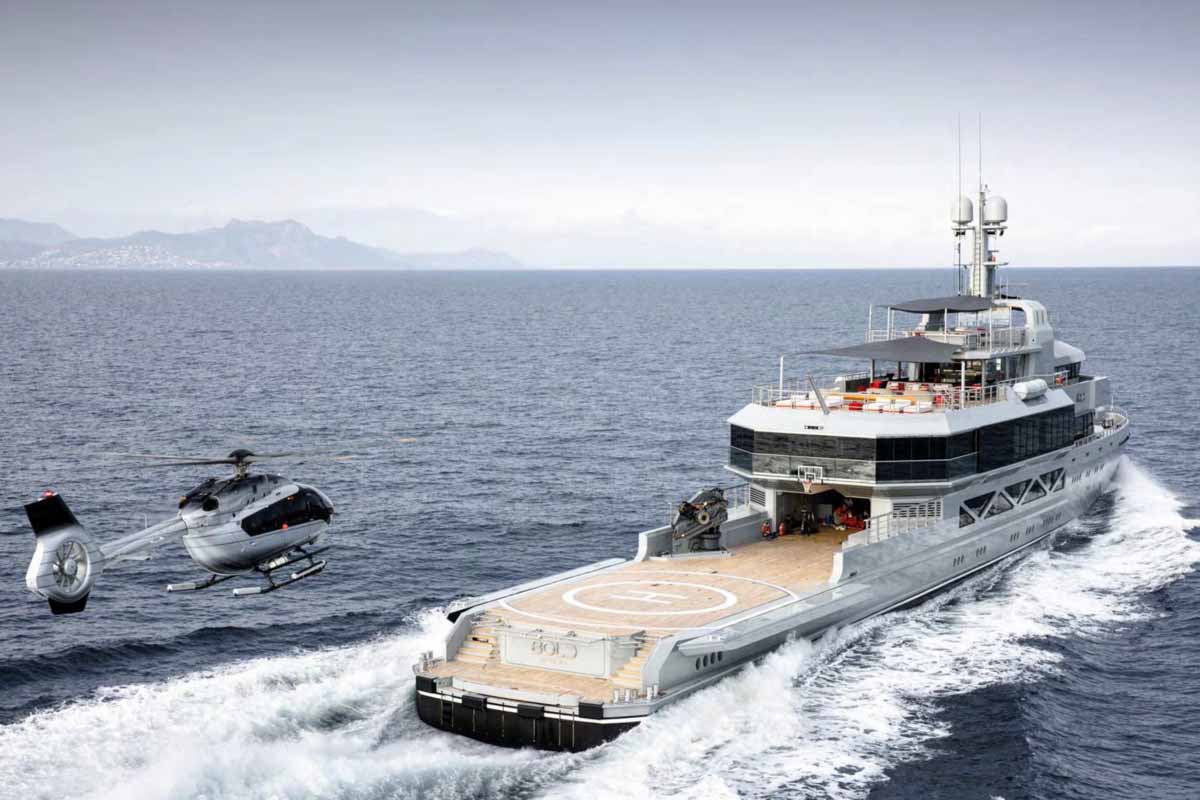 small yacht with helicopter