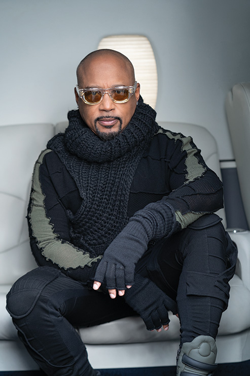 Daymond John in skiing wear aboard a CESSNA 560XL from flyExclusive