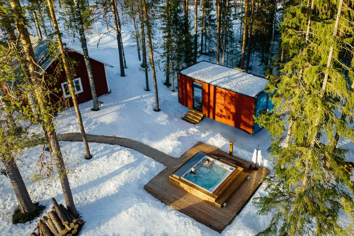 Swedish Lapland Private WildernessLodgeJacuzzi--Courtesy Of Blue Parallel